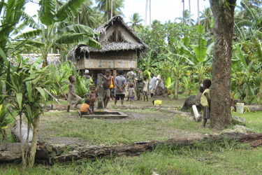 Wells and huts at one of the internally displaced persons centers in Papua New Guinea.