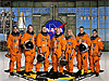 The crew of STS-124 in orange launch and entry suits