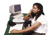 JWOD worker at telephone and computer