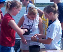 Students check sediment samples aboard FERREL