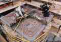 Installation of heat exchanger for large block test at Fran Ridge in January 1997.