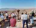 Public open house tour visitors on the crest of Yucca Mountain, November 2001.