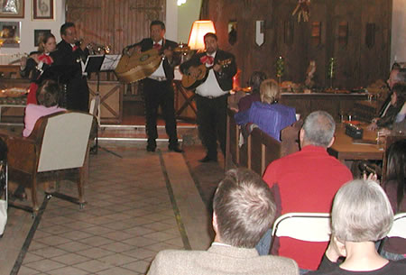 Mariachi band performing to a group of Big Read participants