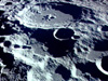 An oblique view of the lunar farside photographed from the Apollo 11 spacecraft in lunar orbit, looking southwest