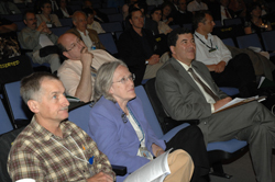 Seated at the symposium are NIDCD Director Dr. James Battey, NINDS Director Dr. Story Landis, NIH Director Dr. Elias Zerhouni (front, from left) and Dr. Mark Freedman (back).