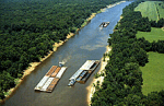 Barge traffic on a busy river.