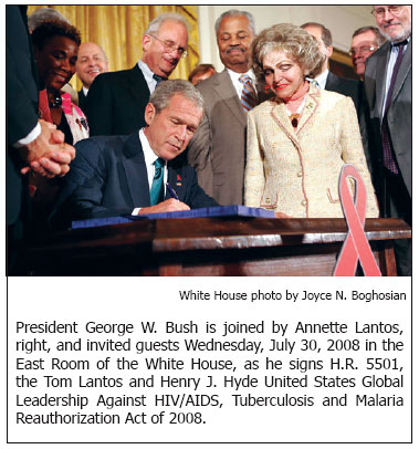 President George W. Bush is joined by Annette Lantos, right, and invited guests Wednesday, July 30, 2008 in the East Room of the White House, as he signs H.R. 5501, the Tom Lantos and Henry J. Hyde United States Global Leadership Against HIV/AIDS, Tuberculosis and Malaria Reauthorization Act of 2008. White House photo by Joyce N. Boghosian