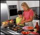 Mother and son in kitchen