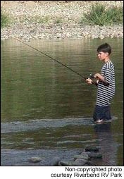 Young camper fishes the Twisp River.