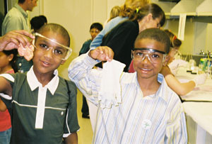 These young men are apparently proud of their accomplishments in the lab, where they seemed to have learned an important lesson from the DNA detective/flubber experiment: science can be lots of fun. 
