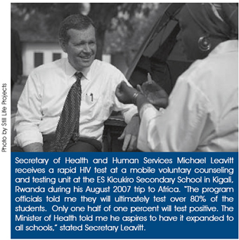 Secretary of Health and Human Services Michael Leavitt receives a rapid HIV test at a mobile voluntary counseling and testing unit at the ES Kicukiro Secondary School in Kigali, Rwanda during his August 2007 trip to Africa. ‘The program officials told me they will ultimately test over 80% of the students. Only one half of one percent will test positive. The Minister of Health told me he aspires to have it expanded to all schools,’ stated Secretary Leavitt. Photo by Still Life Projects