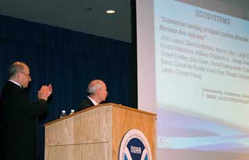 NOAA Research director Richard Spinrad and deputy director Sandy MacDonald acknowledge
    the award recipients during a webcast.