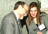 OCC staff Hershel Lipow and Adrienne Mingione looking at new financial literacy materials during National Consumer Protection Week (February 2008).
