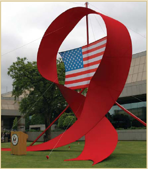 A red AIDS ribbon hangs in front of the U.S. Embassy in Pretoria to mark World AIDS Day, December 1, 2007. Photo by South Africa PEPFAR Team