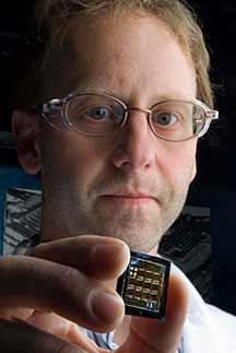 NREL scientist John Geisz and his record solar cell.