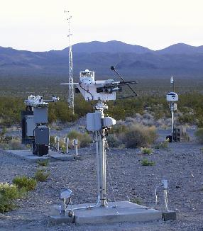 Desert Rock SURFRAD station, including (clockwise from left center) radiometer platform, met tower, TSI and solar tracker.