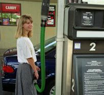 Photo of person refueling car