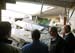 President George W. Bush walks through tornado damage at Enterprise High School in Enterprise, Ala., Saturday, March 3, 2007. The President visited people affected by storms in Americus, Ga., and Enterprise, Ala.