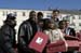 Darrell Green, Chair of the President's Council on Service and Civic Participation, joined local volunteers preparing and delivering disaster preparedness kits to residents of Brookland Manor, Washington, DC.  The project was part of a national mobilization of volunteers for the 2004 Martin Luther King, Jr. Day of Service.