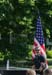 Country recording artist Phil Vassar sings the national anthem Tuesday, May 6, 2008, during Military Spouse Day celebration on the South Lawn of the White House.