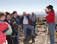 At the top of Yucca Mountain, private citizens learn about the area's geologic features