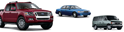 A red pick-up truck, a blue sedan and a dark green van