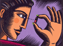 Image of a person looking at a pill