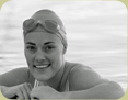 Smiling young woman in swimming pool