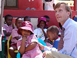 Ambassador Dybul interacts with children at St. Bridget's Preschool in Tonota, Botswana. St Bridget's provides children with physical, emotional, spiritual and intellectual development through the creation of an enabling environment.