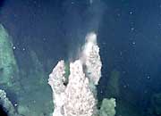 water spews from a vent chimney