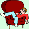 Image of a man sleeping on a chair.