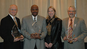 The American Forest Foundation honors three NRCS State Conservationists. From left to right, Richard Sims, State Conservationist of Idaho, Terry Cosby, State Conservationist of Ohio, AFF Senior Vice President Kathy McGlauflin, and Illinois State Conservationist Bill Gradle. NRCS image.