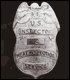 Photo of inspector's badge
