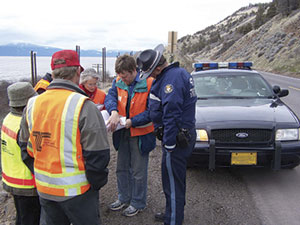 In this photo from Oregon, a team of transportation professionals confers during a road safety audit (RSA) on a stretch of U.S. 97.