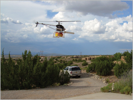 A test flight of the mini-helicopter with its payload near Albuquerque, N.M.