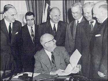 January 11, 1955, President Eisnhower and members of the Clay Committee.