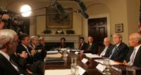 President George W. Bush gives members of the media an overview of the Midwest flood relief plan Tuesday morning, June 17, 2008 in the Roosevelt Room of the White House. President Bush, briefed by domestic policy advisors on the status of the response, said "we're in constant contact with people on the ground to help make sure that we save lives."