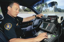 Police on computer in car