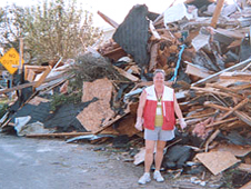 Debbie Murray with Katrina debris.