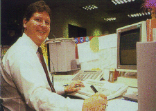 Photo of AT&T Universal man at computer.