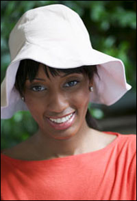 A woman wearaing a hat