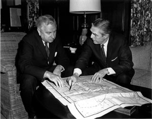 Federal Highway Administrator Rex Whitton, right, meets with Secretary of Commerce John T. Connor, who took office in January 1965, about an Interstate route in Buffalo, NY.