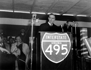 Rex Whitton participated in more opening ceremonies for Interstate highways than any other Federal Highway Administrator. Here he is shown marking the opening of Virginia's portion of the Capital Beltway (I-495) on April 2, 1964.