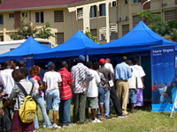 Young people wait in line for voluntary counselling and testing (VCT) during the concert.  Marie Stopes provided free VCT services, and had nearly 400 young people get tested during the event.