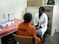Employee at Limbe Leaf Tobacco Company receiving HIV counseling and testing during HIV Counseling and Testing Week, Malawi