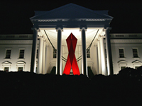 A red ribbon adorns the White House Friday, November 30, 2007, in recognition of World AIDS Day and the commitment by President George W. Bush and his administration to fighting and preventing HIV/AIDS in America and the world. White House photo by Chris Greenberg