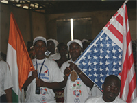 To mark World AIDS Day, the Cote d’Ivoire PEPFAR team took its ‘HIV/AIDS Road Show’ to Danane and Man, two major cities controlled by the New Forces (former Ivorian rebels) in Western Cote d’Ivoire.  The aim of these outreach programs was to sensitize people, especially youth, living in the remotest parts of the country about how to prevent HIV/AIDS. Both sessions drew on a series of short films made by young Africans that address sensitive aspects related to HIV/AIDS by drawing on realistic situations presented in entertaining ways.  Photo by Cote d’Ivoire PEPFAR team