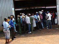 Villagers from Pandamatenga line up outside the grain storage barn to be tested. More than 60 people were tested during the day.  This is more than usually test at the local clinic over a two month period.