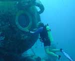 Diver outside of NOAA’s Aquarius at 65 feet under the sea.