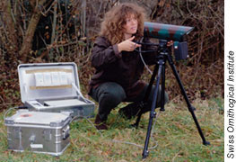 Photo of scientist setting up an infrared video camera